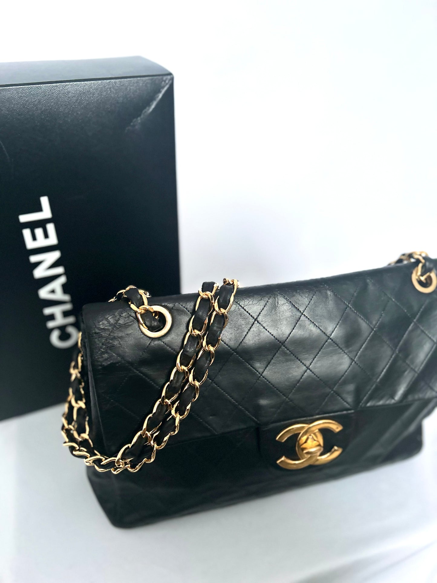 Chanel Black Lambskin Maxi Flap Bag