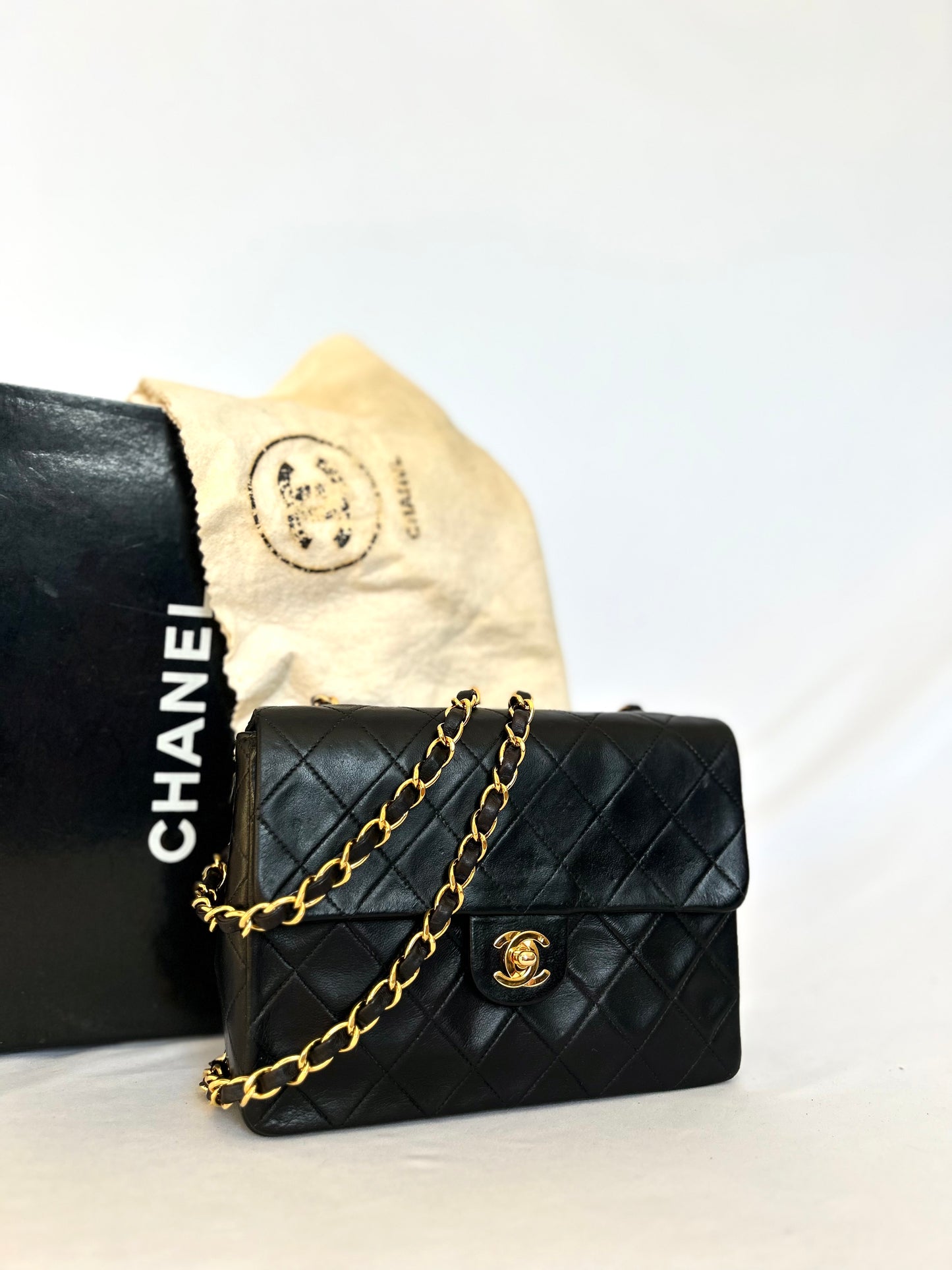Authentic Chanel Black Lambskin Mini Square Flap Bag