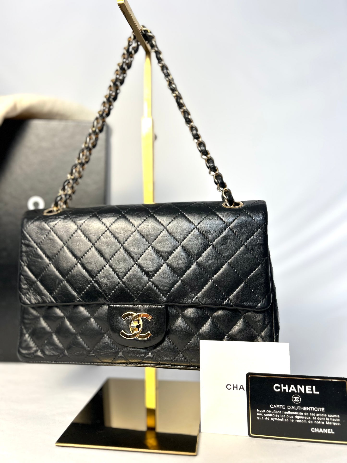Authentic 1980s Vintage Chanel Black Lambskin Medium Classic Flap