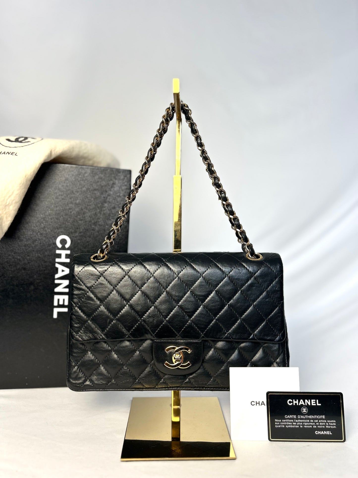 Authentic 1980s Vintage Chanel Black Lambskin Medium Classic Flap
