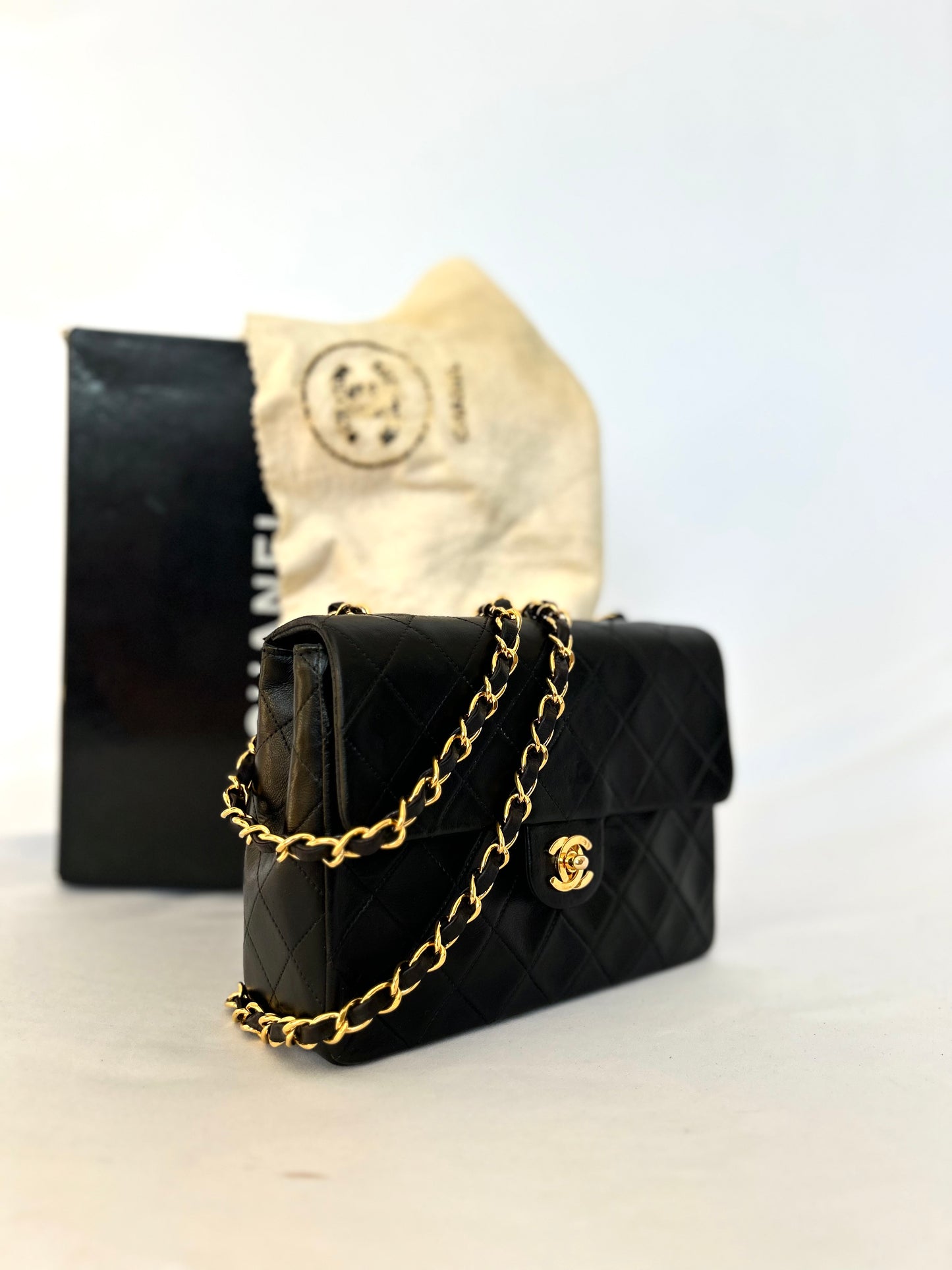 Authentic Chanel Black Lambskin Mini Square Flap Bag