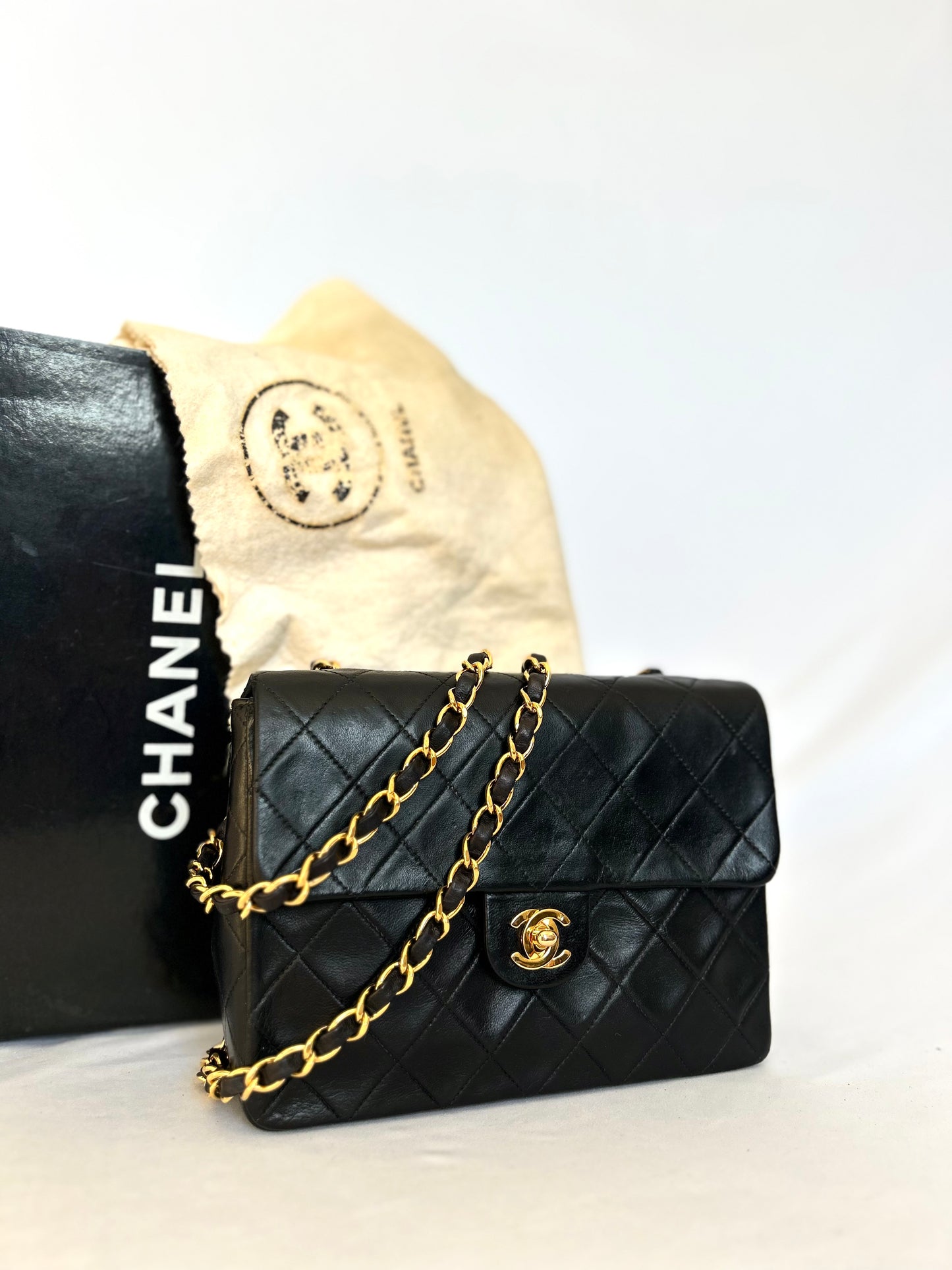 Authentic Chanel Black Lambskin Mini Square Flap Bag