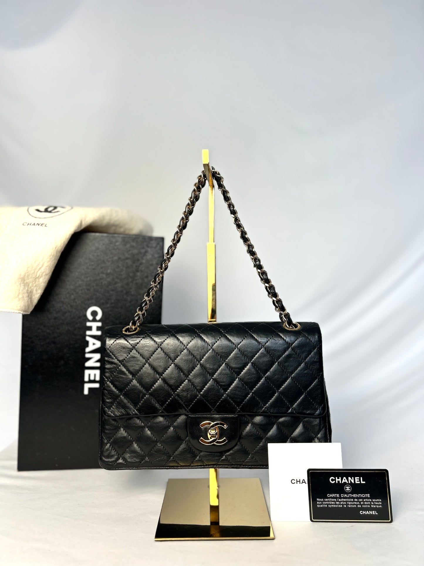 Authentic 1980s Vintage Chanel Black Lambskin Medium Classic Flap