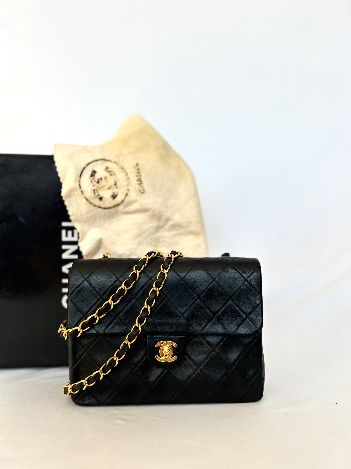 Authentic Chanel Black Lambskin Mini Square Flap Bag